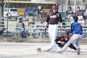 Sullivan's Andy Brown steals home on a passed ball Tuesday evening. The Redskins came back to upset OV in the bottom of the seventh inning to win 12-11.