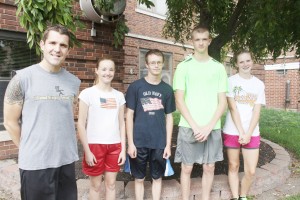 Photo by Keith Stewart Pictured is this year’s Arthur-Lovington/Atwood-Hammond Cross Country team, from leftt to right: head coach Ryan Whalen, Kate Edwards, Ian Edwards, Justin Laughlin, and Brienne Jones.  Not pictured: Mary Singer.