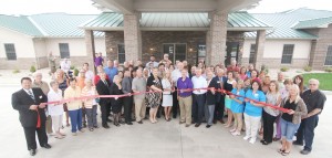 Photo by Keith Stewart Ribbon Cutting Ceremony Carriage Crossing, an assisted living senior community in Arcola, commenced its five-day grand opening with a ribbon cutting ceremony Tuesday morning. Those in attendance included several owners, members of Arcola’s Economic Development, and managers of Carriage Crossing.