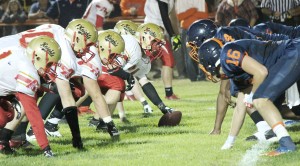 Photo by Darian Hays The Knights’ offensive line gets set against the Broncos defense Friday night in Cerro Gordo.