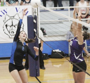 Photo by Keith Stewart OV’s Megan Dash attempts the kill shot Tuesday evening aginst Bement’s Tyler Wegrich. Despite Dash’s 12 kills and 15 blocks, OV went on to fall in three sets.