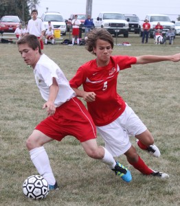 Photo by Keith Stewart David Emrick (left) tries to stave off St. Anthony's Andreas Travnik during Tuesday afternoon's contest in Lovington.