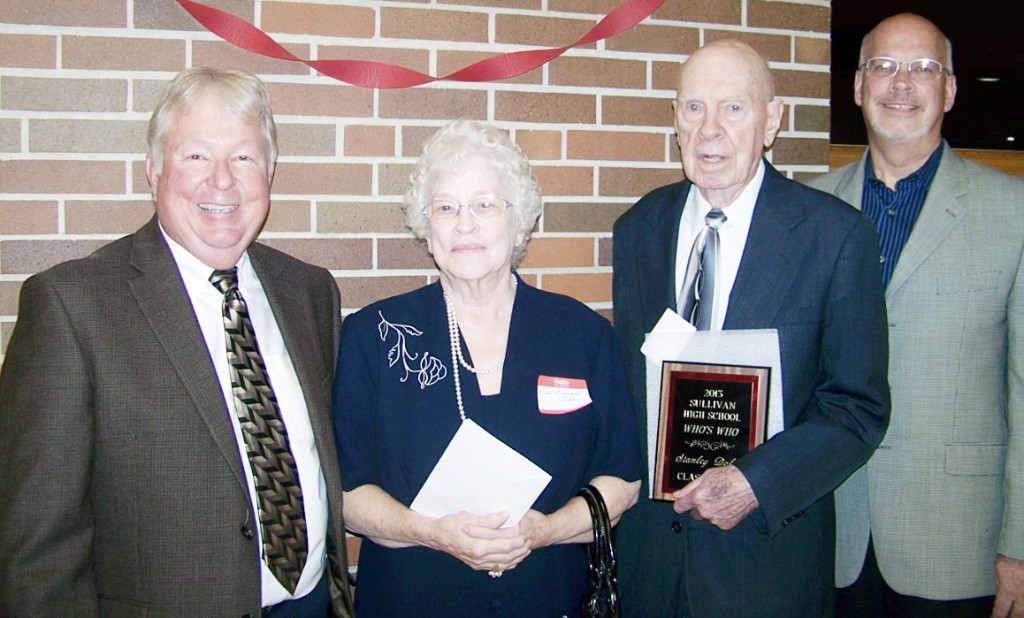 Submitted Who's Who Award Stanley Dolan, 89, a 1941 SHS graduate, was the recipient of this year’s Who’s Who Award. Dolan was presented and introduced by his son Dave. The WWII vet grew up on a farm near Sullivan and attended a one room school house. Dolan went on to work at Taber Grain/ADM and has served along with his wife Mary Margaret as the overseers of the New Life Ministry Center. Pictured left to right are Sullivan school board chairman Steve Poland, Mary Margaret Dolan, Stanley Dolan, and Dave Dolan.