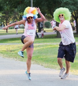 Participants from Saturday's Dart for the Arts put a little funk in their step around Wyman Park in Sullivan.