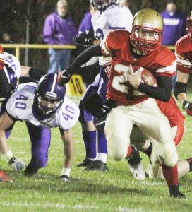 Photo by Keith Stewart Tyler Schuring takes off Friday night. This was a common sight last week when ALAH took on Arcola in Atwood, as Schuring ran for three touchdowns. The junior quarterback also threw for one touchdown and returned an interception for another in his team’s 42-14 victory.