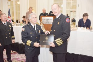 © 2013, John Hartmann Jeff Waite is seen here receiving his Fire Chief Emeritus Award on October 15.