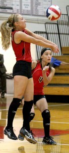 Photo by RR Best Maggie Plank provides a dig during the Lady Red's game against Maroa-Forsyth.