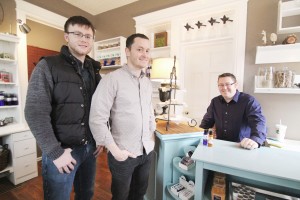 Photo by Keith Stewart Tyler Mosier, Timmy Valentine, and John Stephens (L-R) recently opened the Astoria Company Store, which features homemade soy candles, lotions, soaps, and more. Astoria is located on the first floor of the Harrison Street Inn, in Sullivan.