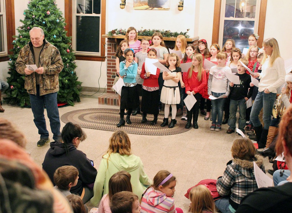 Photo by RR Best Kicking off the Christmas Season Bethany Mayor Bill Ashley addresses a packed room of children and village residents Saturday evening during their annual Christmas tree lighting at the former depot. Be sure to look in next week’s paper to see how the rest of Moultrie County kicked off the holiday season.