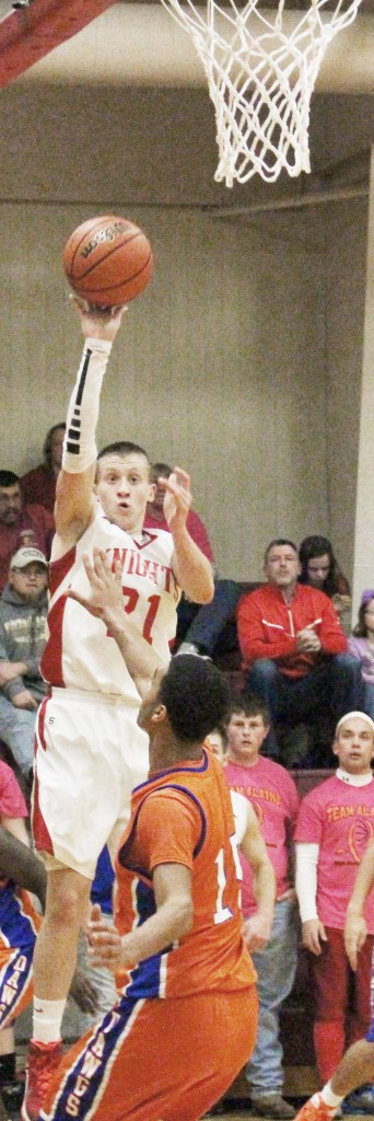 Photo by Darian Hays The Knights’ Tyler Schuring pulls up for the 3-pointer Tuesday night. Despite a barrage of perimeter success early on, the Knights fell to St. Teresa 51-48.