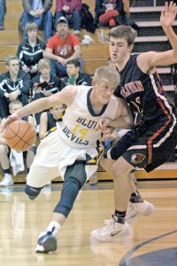 Photo by RR Best Windsor’s Alex Allen tries to drive past Sullivan’s Ty Molzen during Friday night’s matchup.