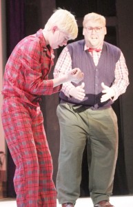 Photo by Keith Stewart A young Ralphie, played by 13-year-old Kyle Klein II, looks down at a pair of broken glasses, as his adult self, played by John McAvaney, looks on during the Little Theatre’s performance of “A Christmas Story.”