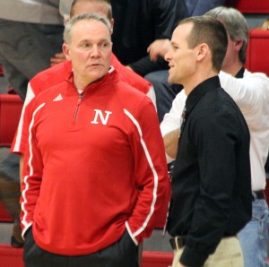 Photo by Keith Stewart Former SHS basketball coach (and current Neoga coach) Bob Lockart and current SHS coach Chester Reeder talk before the start of Saturday's game in Neoga.