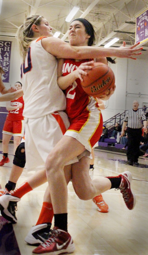 Photo by RR Best ALAH’s Emily Seegmiller tries to drive past a Cerro-Gordo/Bement defender Saturday evening.