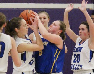 Photo by RR Best Villa Grove/Heritage’s Alix Ezzel fights OV’s Shelby Dash for the ball Saturday.