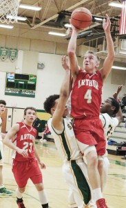 Photo by Susan Shadley The Knights’ Jeremy Plank goes up for a layup Tuesday night.