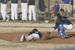 Photo by Keith Stewart Peyton Hagerman makes the tag at home on Windsor/Stew-Stras’ Christian Vonderheide in the bottom of the seventh, preventing the Blue Devils from winning.