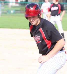 Photo by RR Best Nick Frerichs stands at first base Monday evening. Despite the junior leading Sullivan 3-4 from the plate, including two RBI doubles, Sullivan fell to Warrensburg-Latham 4-3.