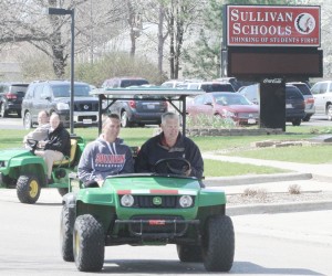 Photo by Keith Stewart Sullivan school administrators and staff leave the high school Tuesday morning and head north on Main Street in search of a female student who had gone missing around 10 a.m. The student was later found safe by a resident volunteering in the search effort.