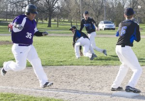 Photo by Keith Stewart OV pitcher Devon Still watches his throw to first as Arcola’s Ronny Olvera of Arcola races to the base in the top of the fifth inning last Wednesday.