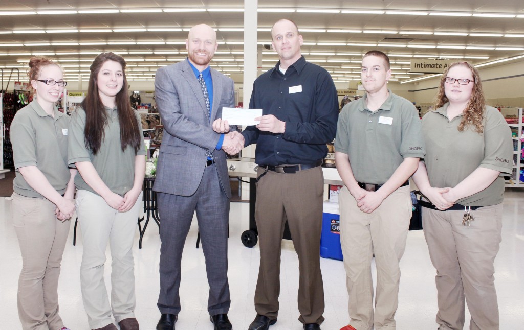 Photo by Keith Stewart Shopko Donates Shoko recently donated a $1,000 check to Sullivan schools. Pictured, from left to right are:  April Reyes (employee), Heather Cody (employee), Ted Walk (SHS assistant principal), J.D. Irons (Shopko manager), Ryan Kalagian (employee), and Kari Fort (employee).