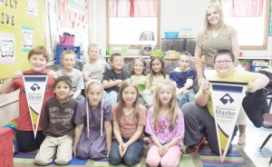 Submitted Pictured is Arthur second grade teacher Kirsten Perkins and her class, which was recently recognized for outstanding achievements in reading. Front Row (left to right) Jesus Corona,  Amy Otto, Selene Rohr, Samantha VanMeter, and Jaydon Yoder. Back Row (left to right) Malachi Gutierrez, Chris Miller, Hunter Grant, Isaiah Sawyer, Evanger Wiley, Ayla Condill, Kayden Bontrager, and Kirsten Perkins. Not Pictured: Darren Miller, Martha Herschberger, Lacey Knox, and Jaylon Herschberger.