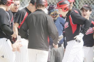 Photo by Keith Stewart An excited Dylan Hart comes home Saturday after hitting a two-run homer in the bottom of the second inning against Decatur LSA.