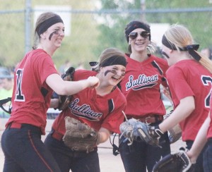 Photo by Keith Stewart Sullivan’s Brittin Boyer (left), and Taylor Gottfriedt (left center) celebrate after turning a double play in the ...inning.