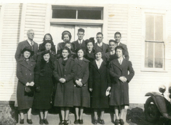 Moultrie Moment of the Week                                                    Pictured here is the United Brethern Church in Kirksville in 1938. Front row: Anna Belle Frederick Malloy, Bernice Graven Elder, Wilma Marble, Ruth L. Matheson Lash, Odessa Donnell Hudson and Emogene Matheson Yarnell-Burrows. 2nd row: Dorothy Faye Matheson, Emel Craig, Unknown, Louise Graven Marshall, Harold Marble. Top row: John Floyd, teacher, Unknown, Anna Mae Marble, Dale Marshall, Bill Sentel and Junior Graven. Photo submitted by Emogene Burrows of Bethany. If you have any other information, please contact the Moultrie County Historical Society at 217-728-4085.