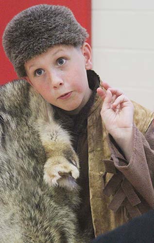 Photo by Keith Stewart Sullivan fourth grader Ben Bushue portrays Davy Crockett during the live wax museum project at Sullivan Elementary.