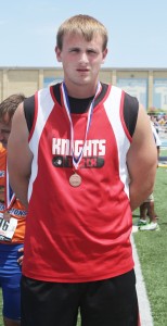 Photo by Keith Stewart Colton Yeakley is seen with his seventh place medal in the discus at the IHSA state track meet in Charleston May 31. 