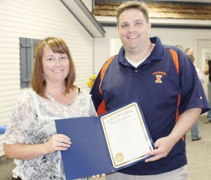 Submitted Kinney Recognized Pictured are Senator Chapin Rose with outgoing Douglas and Moultrie County Farm Bureau Manager Kara Kinney. Senator Rose attended the open house at the Douglas County Farm Bureau June 5 and presented Kinney with a certificate of Senate Recognition from the state of Illinois in recognition of her years of dedication and service as manager for the Moultrie and Douglas County Farm Bureaus. 