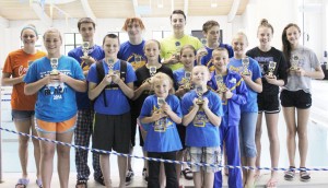 Submitted by Don Rousser Pictured are a portion of the Sullivan Blue Dolphins’ trophy winners from their June 1 meet: Front row, left to right: Tabitha Clark and Kaiden Smith; Middle row: Allison Oligschaeger, Brodie Goss, Ailey Mitchell, Gabrielle Spain, Noah Spain, and Calista Clark. Back row: McKenna Kull, Dylan Sanders, Connor Russell, Charlie Goss, Addison Graham, Anna Wooters, and Natalie Drury.