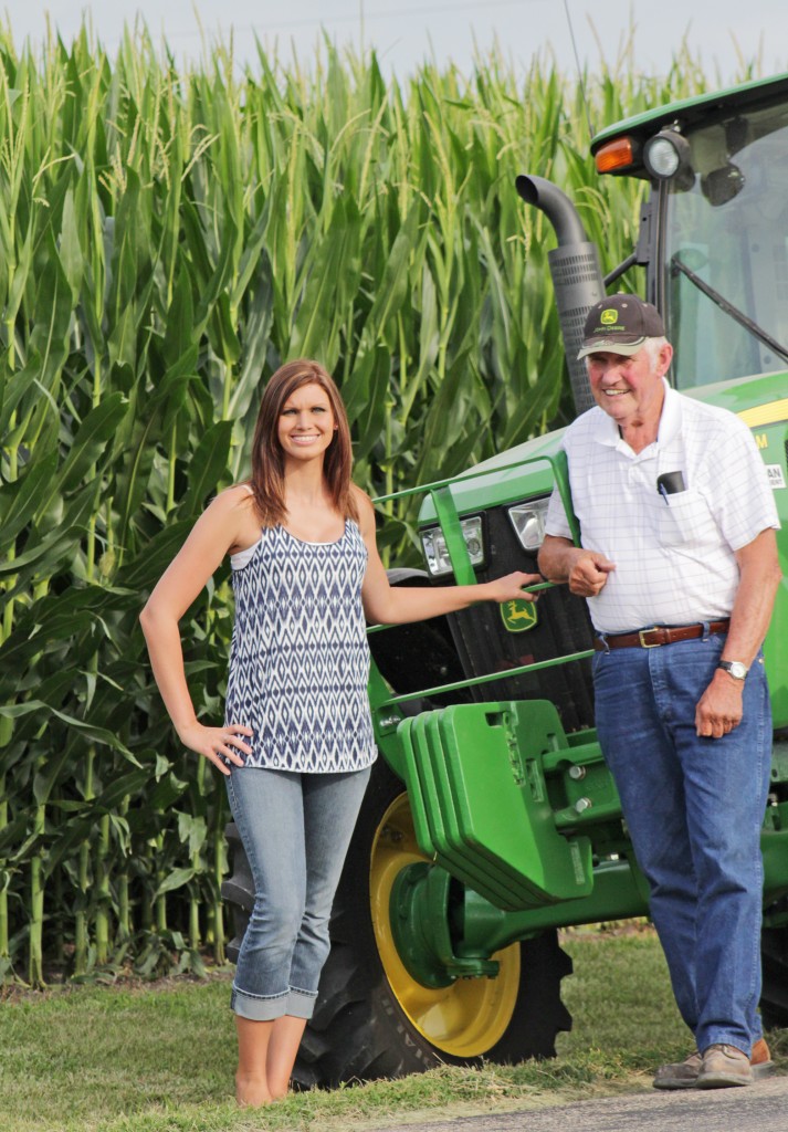 Photo by RR Best Knee-high by the Fourth of July Alisha Warren and her grandfather Terry stand outside the family farm in rural Sullivan. Mild weather and fair amounts of precipitation have helped spawn tall robust fields of corn in Moultrie County.