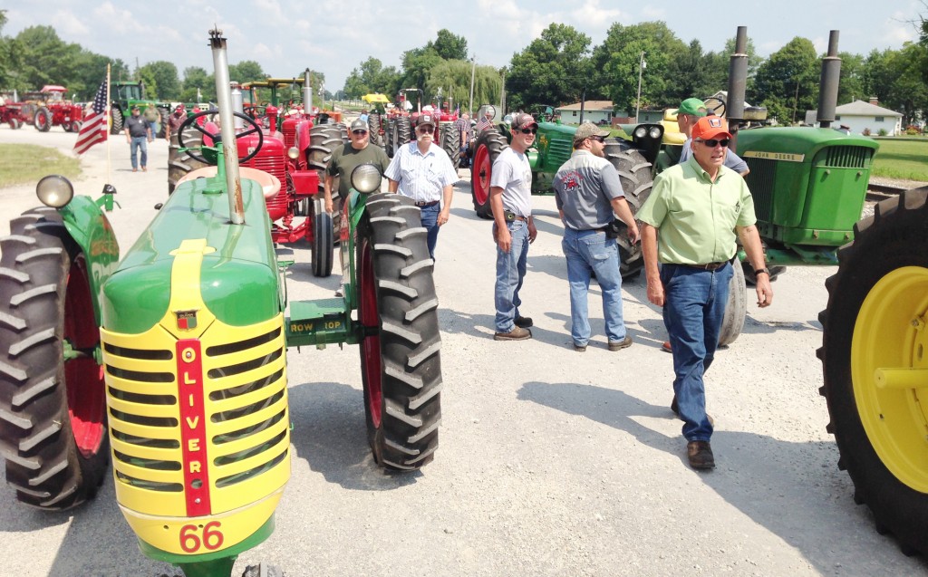 Photo by RR Best Emmett Sefton Memorial Drive Dozens of antique tractors were downtown in Dalton City Sunday morning as part of the inaugural Emmett Sefton Memorial Drive, which began in Mt. Zion and traveled to Dalton City before returning to its starting location. Sefton was an active farmer dedicated to agriculture and a past Macon County Farm Bureau Board president, foundation trustee, and sat on several committees over the years. The drive was sponsored by the Macon County Farm Bureau Foundation and raised money for the Emmett Sefton Memorial Scholarship Fund. Nearly 40 individuals participated.