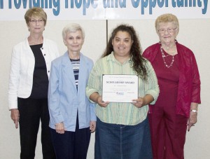 Submitted Pictured, from left to right, are: Arlene Aschermann, board member, Vickie Bowers, board member, Samantha Fenton, recipient of a C.E.F.S. Educational Scholarship, and Jean Finley, board chairperson. 