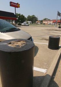 Photo by Keith Stewart Where flag poles were once erect are now just the remnants of those taken down last week at the Hardee's in Sullivan. In total, three flag poles were removed after longstanding disrepair in a move that owner Jason LeVecke described as out of respect for the flags.