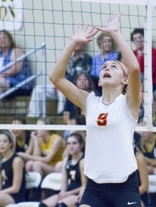 Photo by Keith Stewart Freshman Madison Brown looks up in preparation to set the ball against Tuscola last Thursday. Brown led the team in both aces and assists with 3 and 14 respectively.