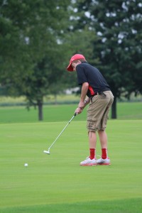 Photo by RR Best Sullivan's Tommy Schibur puts during last Thursday's triangular at the Sullivan Country Club.