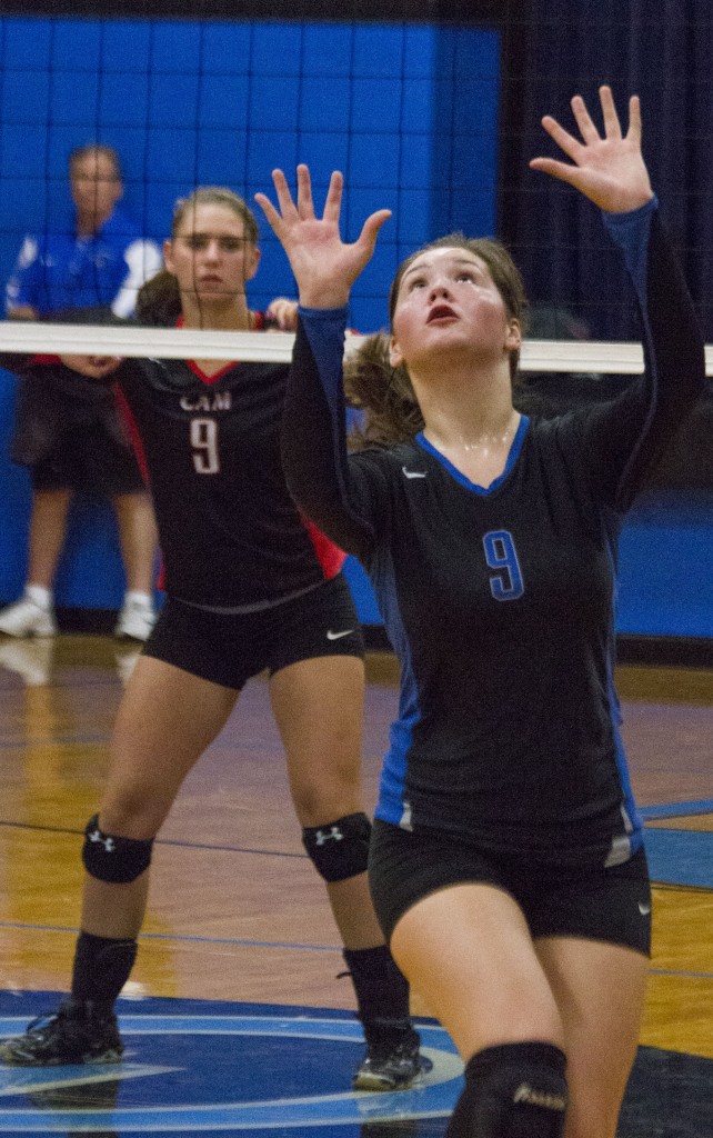 Photo by Keith Stewart OV's Nicole Miller eyes the ball before setting it Tuesday night.