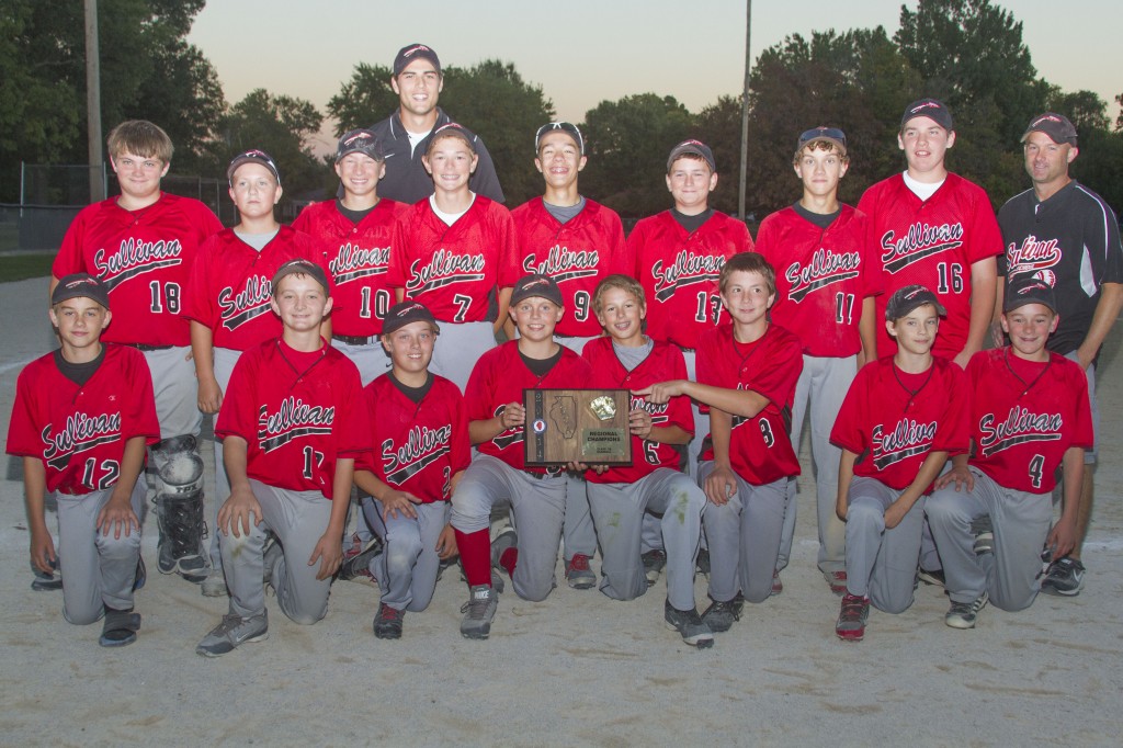 Photo by Keith Stewart Pictured is the 2014 Sullivan Middle School baseball team with its regional championship plaque Monday evening. The Redskins defeated Argenta-Oreana 9-7 in Sullivan to earn their first title in five years. Front row, left to right: Andrew Kirk, Brycen Dalbey, Tim Lawyer, Matt Klukis, Case Crawford, John Meyer, Gary Herschberger, and Ethan Foster. Back row, left to right: Ian Hill, Beau Atchison, Dalton Rogers, head coach Jon Harwood, Caden Ellis, Gabe McGregor, Wyatt Sentel, Spencer Johnson, Aaron Garvey, and assistant coach Troy Rogers.