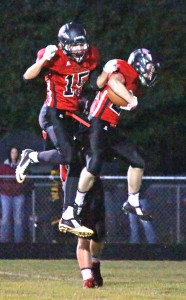 Photo by RR Best Alec Ballinger (no. 15) and Jake Eaton celebrate after SOV took a 15-14 lead over Tuscola Friday night.