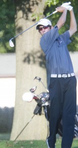 Photo by Keith Stewart Sophomore Clayton Miller tees off. Miller had a season best Monday, shooting three under par for a 32, easily earning the medal. Davis was second with a 41. 