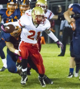 Photo by Keith Stewart ALAH’s freshman Marcus Vanausdoll escapes a pack of Broncos during Friday’s contest. Vanausdoll had two carries for 15 yards and two catches for seven yards.