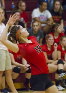 Alyssa McArthur prepares to serve late in to the second set Thursday evening. McArthur helped lead her team on a 5-0 run, but it was too little, too late, as ALAH fell in two sets to Sangamon Valley.