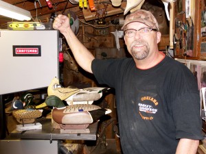 Photo by Barry Feateringill Geoff Auten of Sullivan is seen with a few of his homemade duck decoys, a hobby he has enjoyed for 15 years.