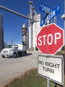 Photo by Keith Stewart A grain semi-truck enters the queue line at the Heritage Grain Co-op elevator in Bethany Tuesday morning. Earlier this month an engineer explained to the Bethany village board that Robinson Street was not meant to handle such traffic.