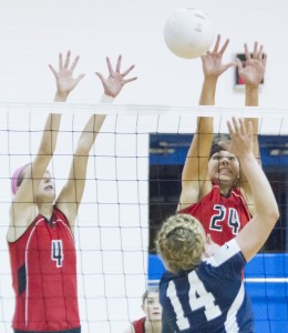 Photo by Keith Stewart Kailyn Boyer (no. 24) and Laine Crawford (no. 4) try to block Windsor’s Bayleigh Tabor Monday night.