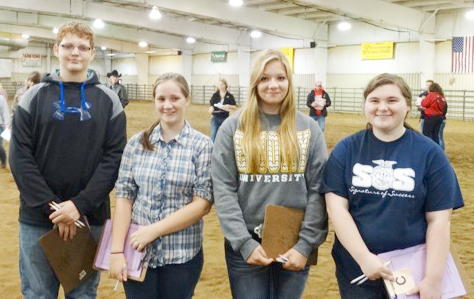 Submitted ALAH FFA Attends State FFA Horse Judging The Arthur-Lovington-Atwood-Hammond FFA chapter went to its first career development event of the school year. Darian Hays, Katie Gingerich, Kayley LaGrou, and Isaac Ashenfelter left at 5 a.m. to travel all the way to Black Hawk College in Kewanee to judge eight classes of horses in the State Horse Judging Contest with 214 other students.  The ALAH FFA Chapter was part of the 63 schools that did the non-reasons classes. Other students that were in the reasons classes later gave a presentation about how they judged the horses. The ALAH students judged four riding classes and four halter classes. The halter classes were judged only on their physical appearance and how they trotted. The riding classes involved judging horses on complicated riding patterns.   The Arthur-Lovington-Atwood-Hammond FFA Chapter earned a B rating and a red ribbon, and Hays had the best score of 338.