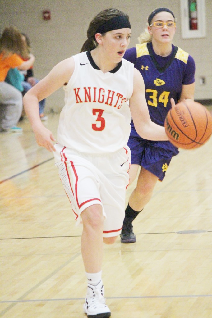 Photo by Darian Hays ALAH's Kim Davis dribbles downcourt.